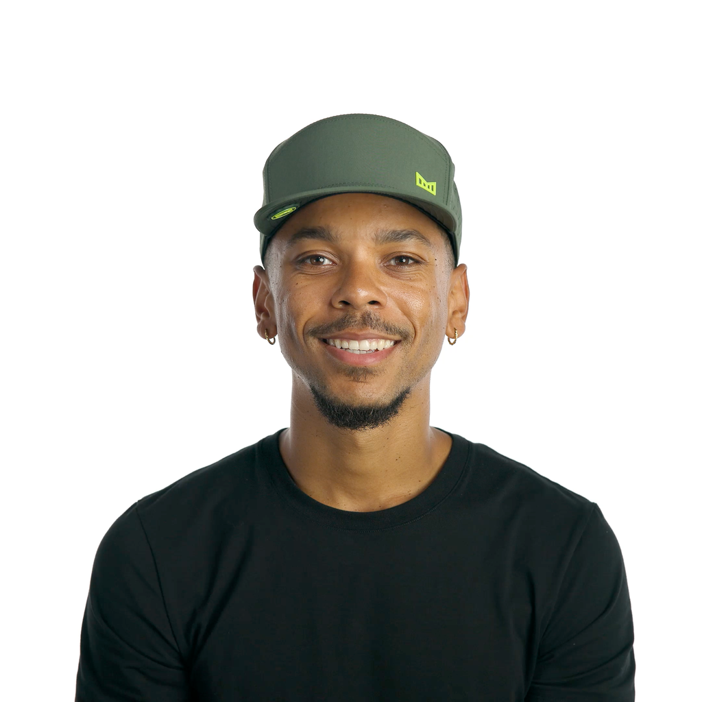 The model-image of the Melin Horizon Fit Trenches Icon Hydro hat in Kombu Green Big Image - 2