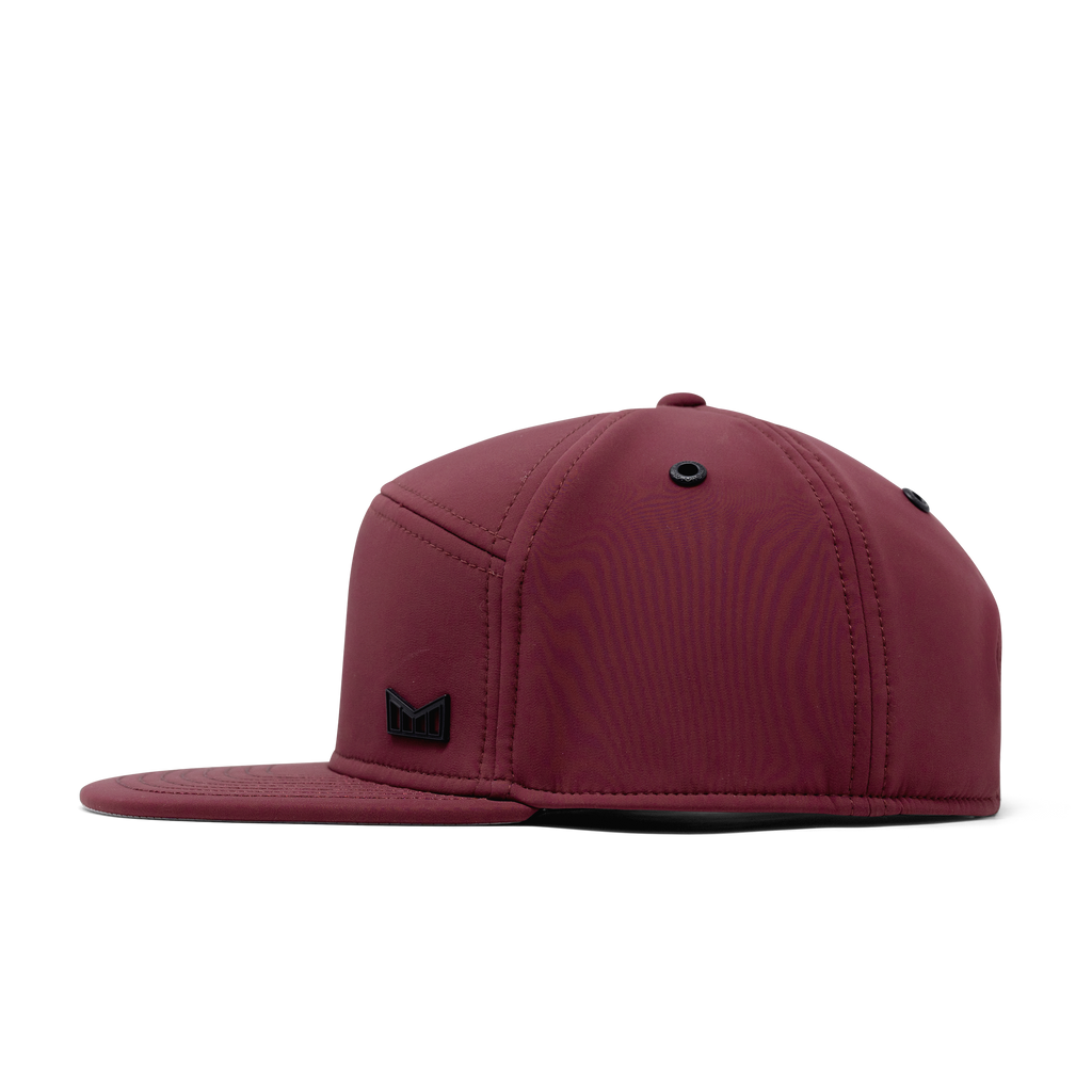 The side view of melin's Trenches Icon Infinite Thermal snapback hat in Maroon. Big Image - 4