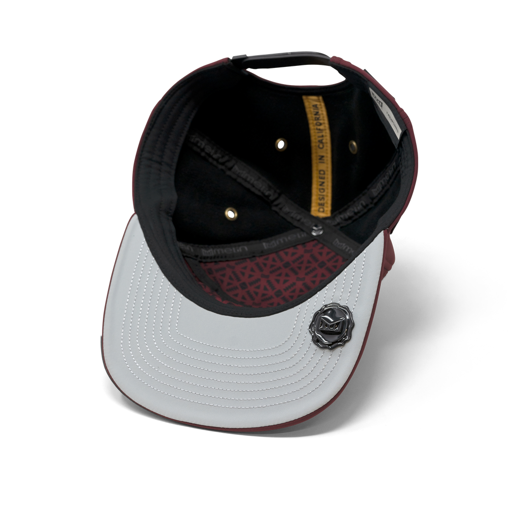 The inside view of melin's Trenches Icon Infinite Thermal snapback hat in Maroon. Big Image - 6