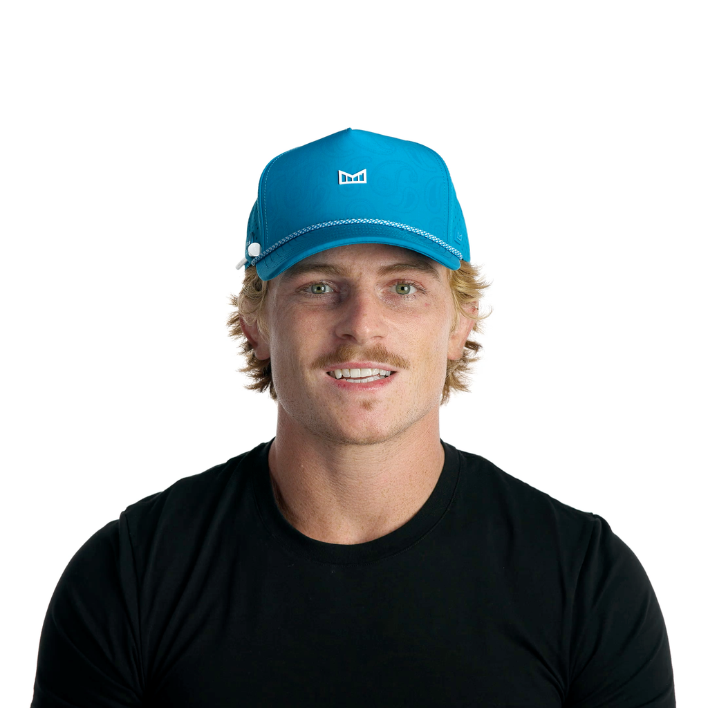The model-image of the Melin Split Fit Odyssey Links Hydro hat in Electric Blue Big Image - 2