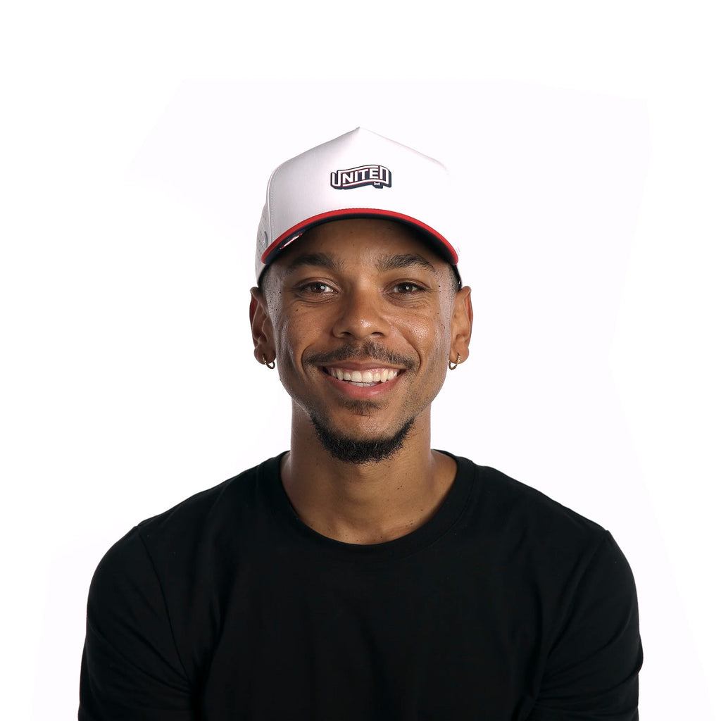 The model-image of melin's Odysea Americana Hydro snapback hat in White / Red / Navy Big Image - 2