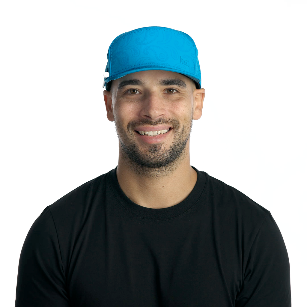 The model-image of the Melin Horizon Fit Trenches Links Hydro hat in Electric Blue Big Image - 2