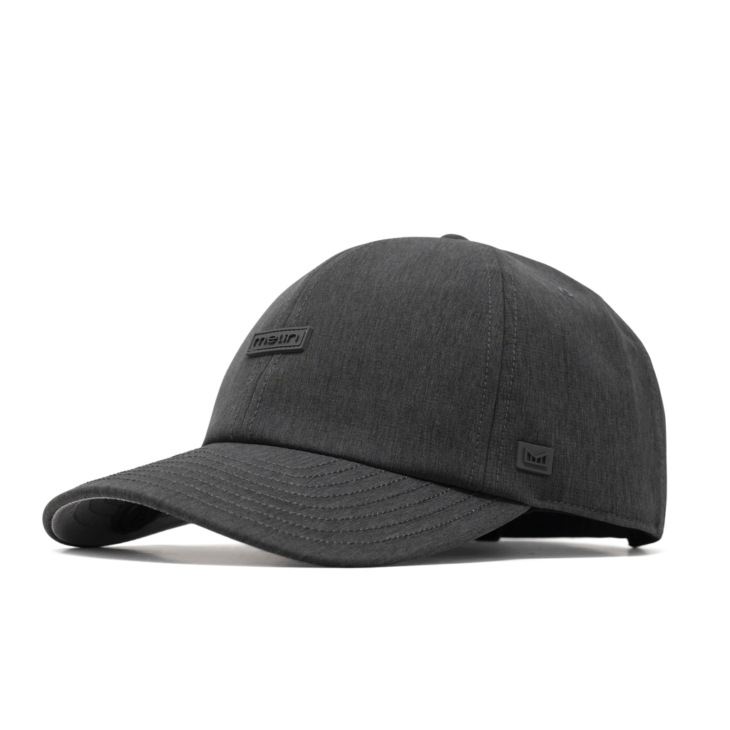The front, angled view of the melin The Legend Hydro  Performance Dad Hat in  Heather Charcoal Big Image - 1