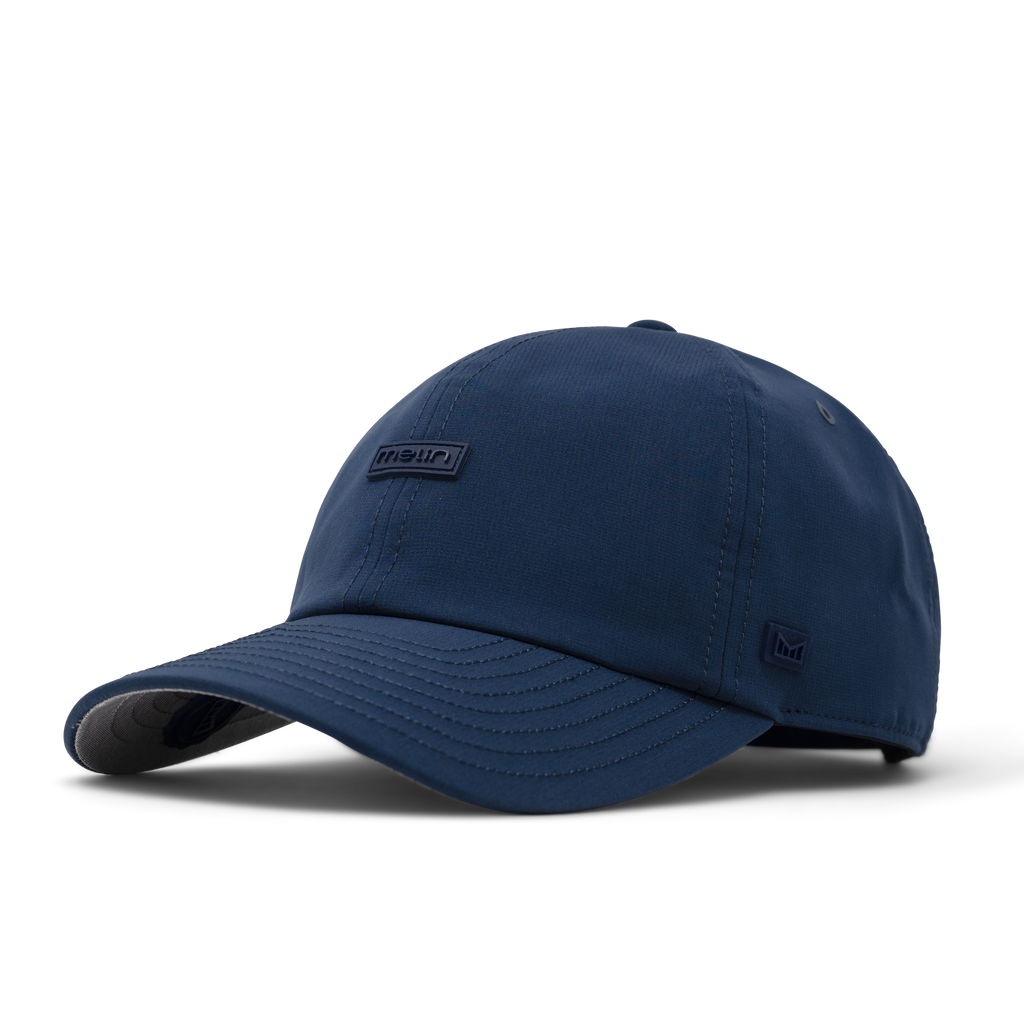 The front, angled view of the melin The Legend Hydro  Performance Dad Hat in  Navy Big Image - 1