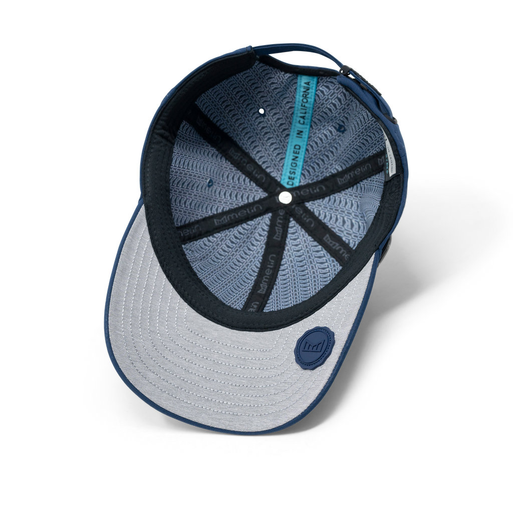 The inside view of the melin The Legend Hydro  Performance Dad Hat in  Navy Big Image - 6