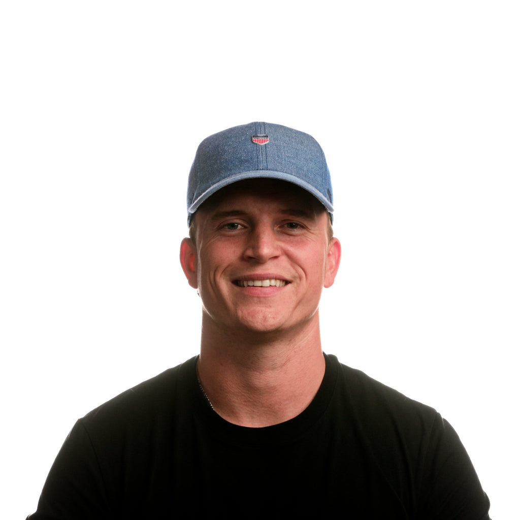 The model-image view of the melin Performance Dad Hat The Legend Mill United in Chambray Big Image - 2