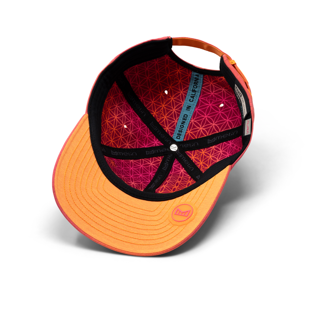 The inside view of the melin The Legend Hydro  Performance Dad Hat in Sunset Aura Big Image - 6