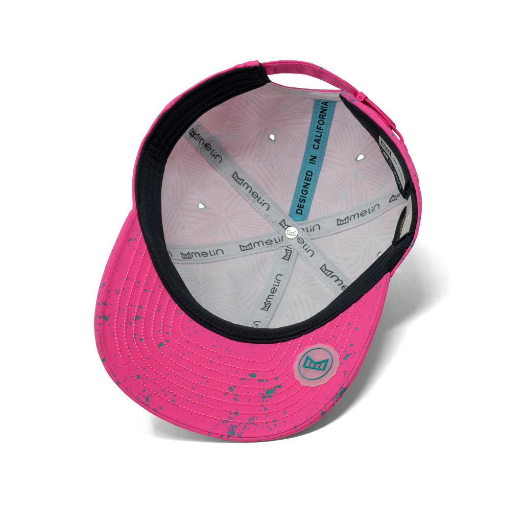 The inside view of the melin The Legend Neon Hydro Performance Dad Hat in Hot Pink Big Image - 6
