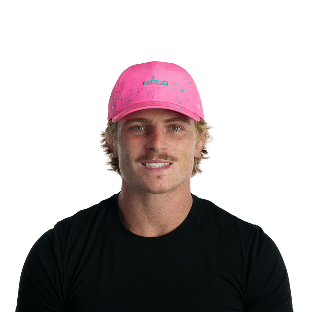 The model-image view of the melin Performance Dad Hat The Legend Neon Hydro  in  Hot Pink Big Image - 2