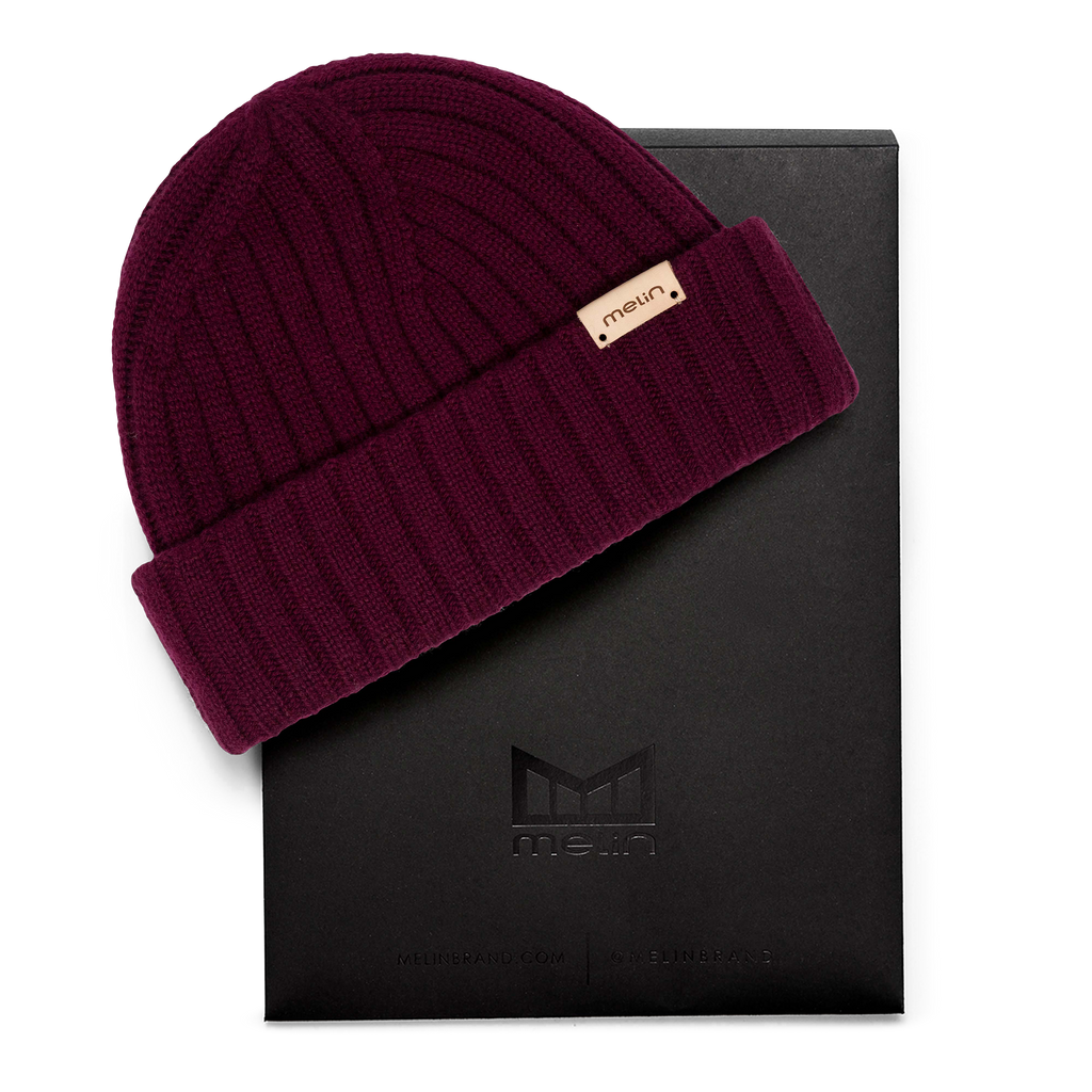 The frontal view of the Melin Louie Vito All Day Beanie in maroon next to packaging Big Image - 4