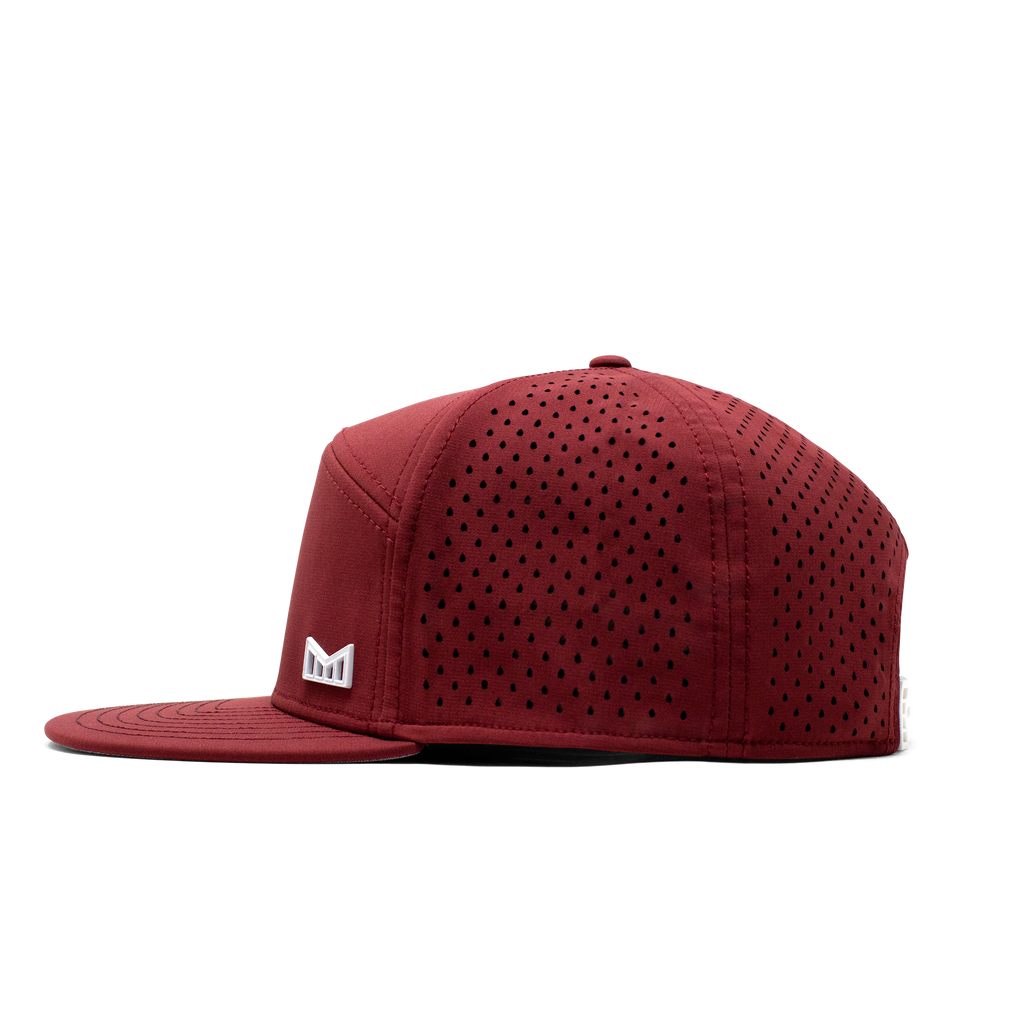 The side view of the Melin Horizon Fit Trenches Icon Hydro hat in maroon Big Image - 3
