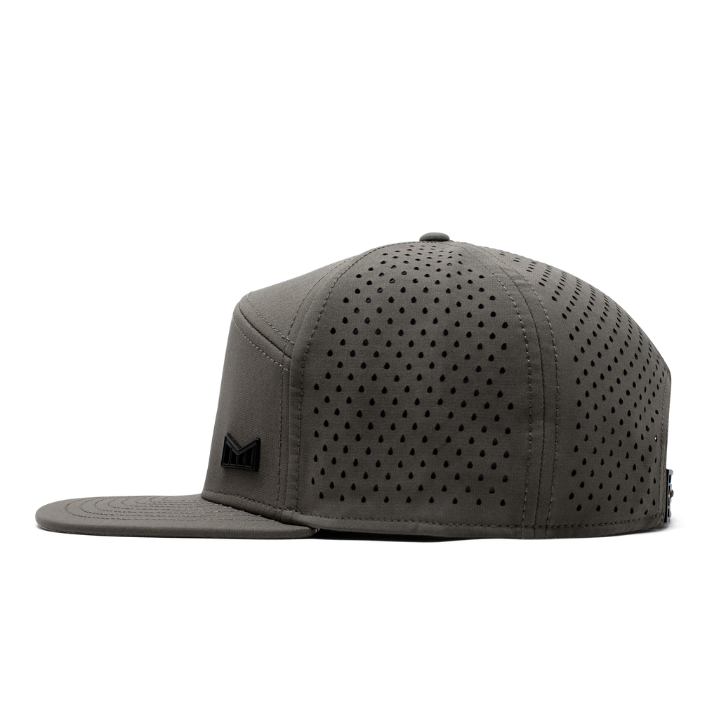 The side view of the Melin Horizon Fit Trenches Icon Hydro hat in green Big Image - 3