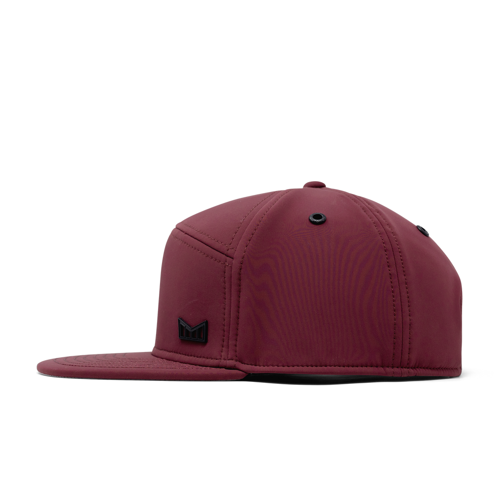 The side view of melin's Trenches Icon Infinite Thermal snapback hat in Maroon. Big Image - 3